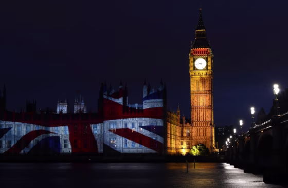 The flag of Great Britain is projected onto the House of Parliament and Big Ben during a light show to mark the start of the 2012 Olympic Games on July 27.