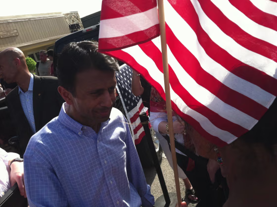 Louisiana Gov. Bobby Jindal speaks with a Romney supporter in Coral Springs, Fla. Saturday.