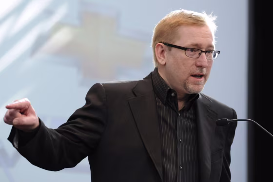 Former General Motors Co U.S. marketing chief Joel Ewanick speaks in Los Angeles in this file photo taken November 18, 2010. Ewanick's ouster is just one of several issues the automaker is dealing with this week.