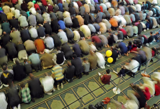 Muslims gather to pray at the Omar al Farouk Mosque in November 2010 in Anaheim, Calif. In that Southern California community, tensions flared after an FBI informant, Craig Monteilh, infiltrated mosques to gather information.