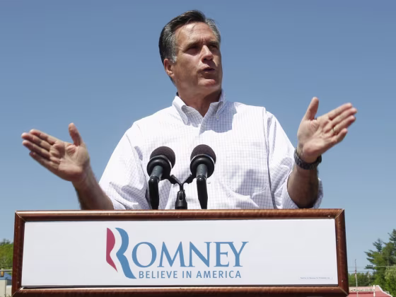 Mitt Romney speaks to supporters in front of Sawyer Bridge during a campaign event in Hillsborough, N.H., May 18, 2012.
