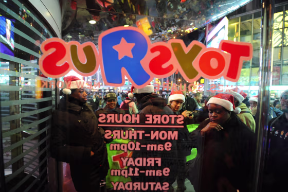Shoppers line up outside Toys 'R Us in Times Square in New York for Black Friday specials. Click the photo for a PhotoBlog report on the frenzy.