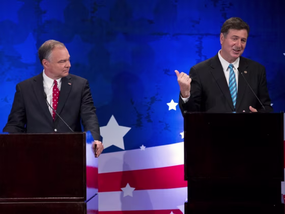 Republican candidate George Allen, right, speaks as Democratic candidate Tim Kaine looks on during a Senatorial debate for the Virginia U.S. Senate seat on Thursday, Sept. 20, 2012 in McLean, Va.