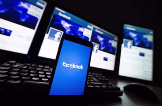 Facebook on phone, computers