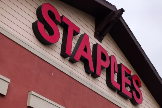 A Staples store is shown in Encinitas, California in this February 28, 2012 file photograph. Staples shares tumbled Tuesday after the company announced a major revamp, including store closures and a pretax charge.