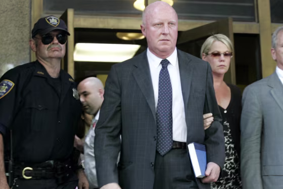 Former Tyco CEO Dennis Kozlowski, center, leaves court with his wife, Karen, right, in New York, Friday, June 17, 2005.