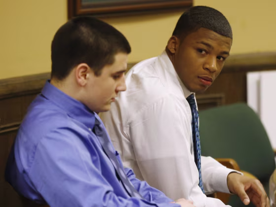 Trent Mays (L) and Ma'lik Richmond (R) sit in juvenile court in Steubenville, Ohio, on March 15, 2013. They were convicted of raping a teenage girl.
