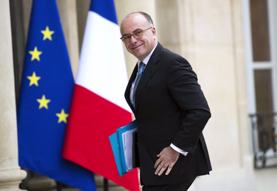 A file photo taken on October 31, 2013 shows French Junior Minister for Budget Bernard Cazeneuve arriving at the Elysee presidential palace to attend a meeting with the French President and football club presidents focused on the millionaires' 75 percent super tax.
