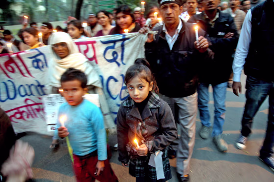 Indian activists participate in a candle-light vigil held against the brutal Delhi gang-rape in New Delhi, India, on Feb. 2, 2013.