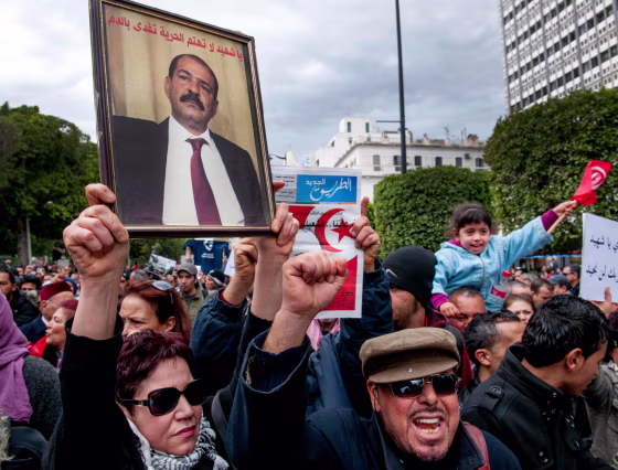 In a protest in Tunis on Saturday, hundreds of demonstrators demanded that the Islamist party in power find and arrest the killer of secular opposition politician Chokri Belaid.