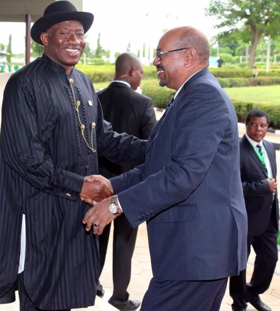 President of Nigeria Goodluck Jonathan, left, and Sudanese President Omar al-Bashir right, shake hands before an African Union summit on health focusing on HIV and AIDS.