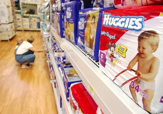 ** FILE ** In a file photo a shopper and her child look at diapers at a Little Rock, Ark., Wal-Mart Super Center store Wednesday, Aug. 24, 2004. Kimbe...