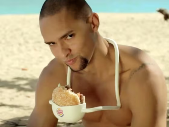 Alas! Burger King says it's not really making hands-free Whopper holders. It was just an ad campaign.