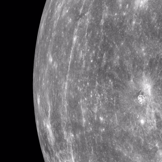 Messenger acquired this image of Mercury's horizon on March 29 as the spacecraft was flying northward along the first orbit during which its dual-camera system was turned on. Bright rays from Hokusai Crater can be seen running north to south in the image.