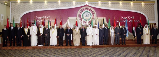 Heads of Arab states line up for a photo at the opening of the Arab League summit in Doha on Tuesday.