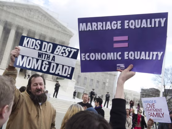 Same-sex marriage supporters talk with same-sex marriage opponents in front of the Supreme Court on March 26, 2013 in Washington, DC, as the Court takes up the issue of gay marriage. The US Supreme Court on Tuesday heard arguments on the emotionally charged issue of gay marriage as it considers arguments that it should make history and extend equal rights to same-sex couples.