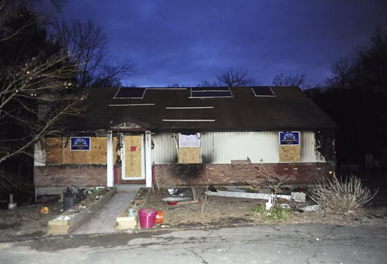 A house belonging to the Barth family in Newtown, Conn., is seen on March 28, the day after it was destroyed by fire.