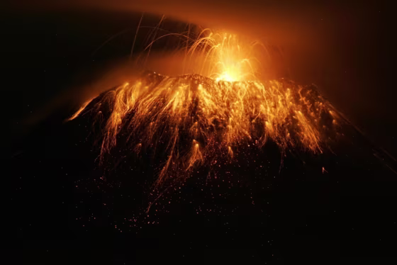 Lava spurts out from the Tungurahua volcano in Pelileo, Ecuador, on May 8.