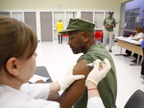 IMAGE DISTRIBUTED FOR NATIONAL COUNCIL ON AGING AND SANOFI PASTEUR - Joseph Robert receives his flu shot during the Falls and Flu Prevention Day at th...