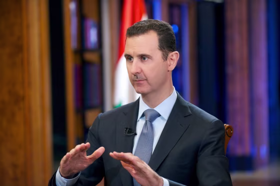 Syrian President Bashar al-Assad gesturing during an interview with Fox News in Damascus.