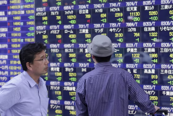 Asian markets slumped and futures for U.S. markets pointed to a sharply lower opening as investors nervously watched the shutdown pantomime in Washing...