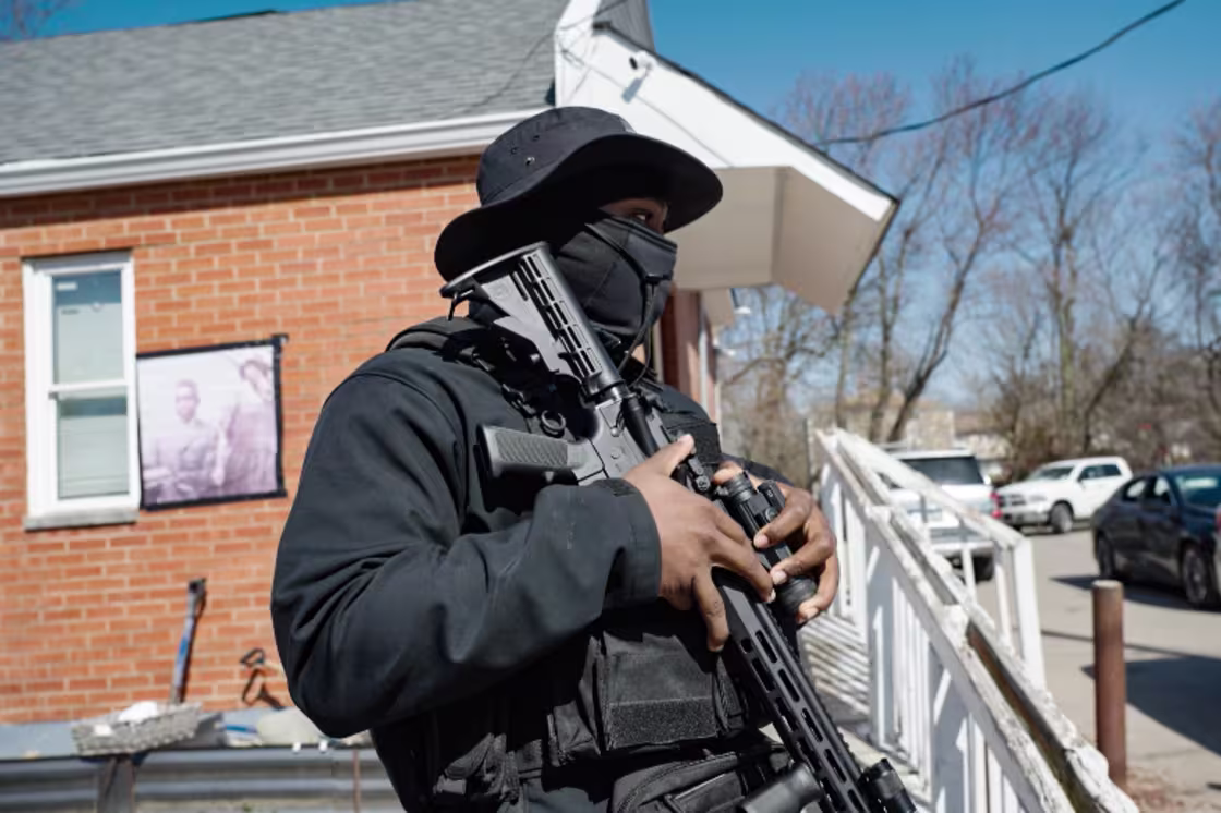 An armed volunteer for the Lincoln Heights Safety and Watch Program