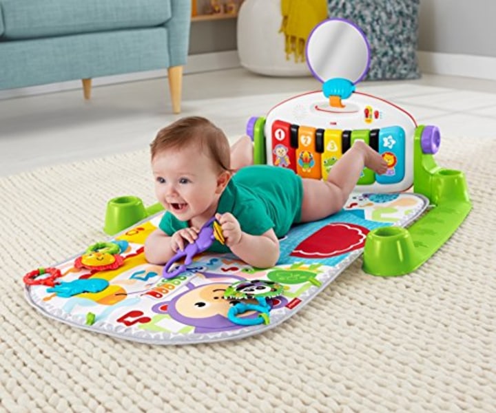 Fisher-Price Deluxe Kick &#039;n Play Piano Gym