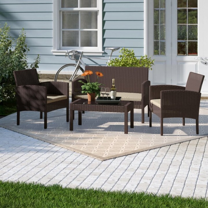 Tessio 4 Piece Rattan Seating Group with Cushions