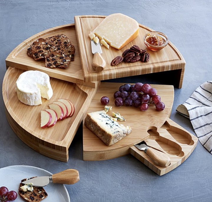 Uncommon Goods Compact Swivel Cheese Board with Knives