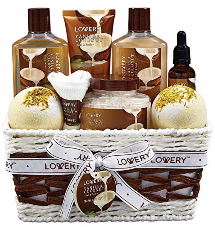 Bath and Body Gift Basket For Women and Men - 9 Piece Set of Vanilla Coconut Home Spa Set, Includes Fragrant Lotions, Extra Large Bath Bombs, Coconut Oil, Luxurious Bath Towel &amp; More