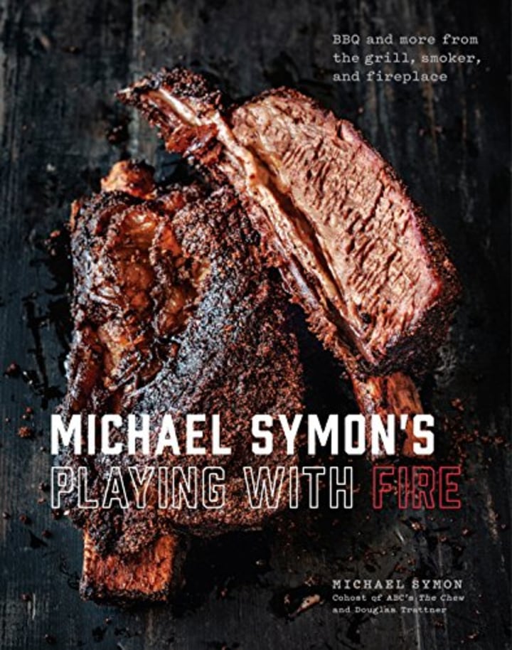 Michael Symon&#039;s Playing with Fire: BBQ and More from the Grill, Smoker, and Fireplace: A Cookbook