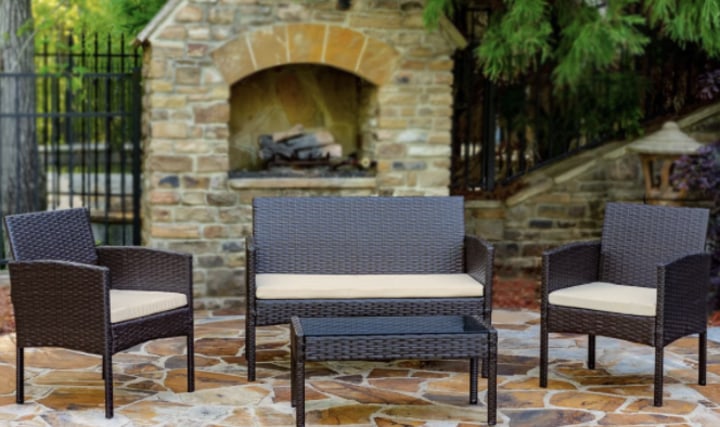World Menagerie Tessio 4 Piece Rattan Seating Group with Cushions