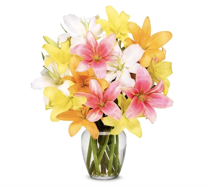 Lily Bouquet Deluxe with Vase. Best Mother's Day flowers and floral delivery services.
