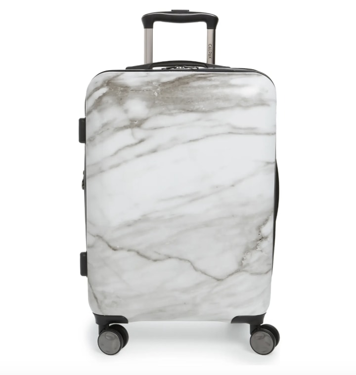 CalPak Astyll 22-Inch Rolling Spinner Suitcase