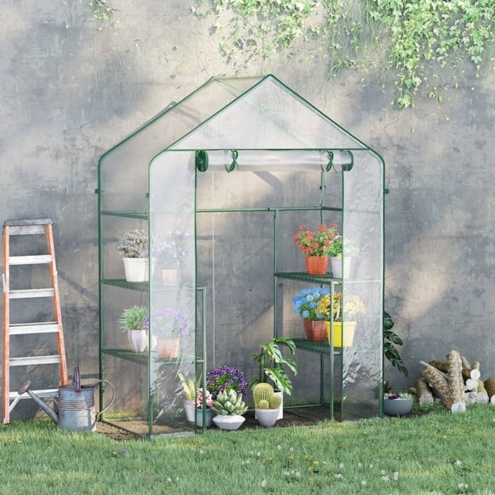 Outsunny 6&#039; L x 8&#039; W x 7&#039; H Outdoor Walk-In Tunnel Greenhouse with 3-Levels of Shelving, Roll-up Door, &amp; Weather Cover