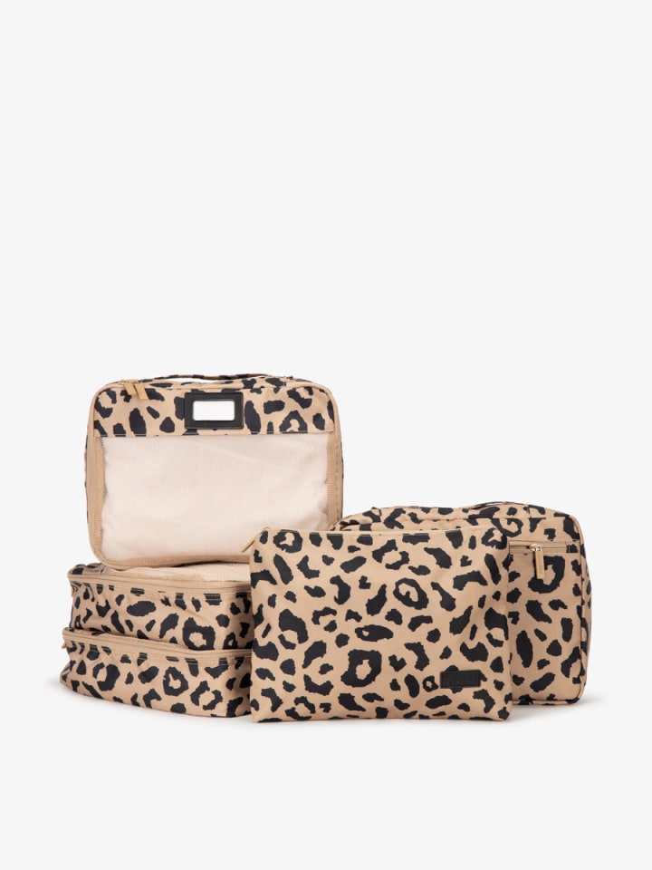 https://media-cldnry.s-nbcnews.com/image/upload/t_fit-720w,f_auto,q_auto:best/newscms/2023_18/1970666/packing-cubes-5-pieceset-cheetah-1-2048x-63ff7e6ee1162.jpg