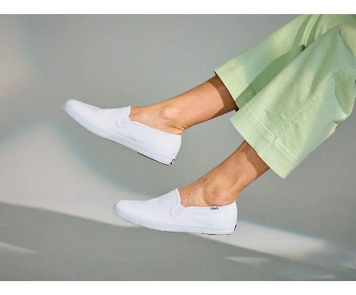 Keds Women&#039;s Champion Canvas Slip-On Sneaker, White, 7 M US