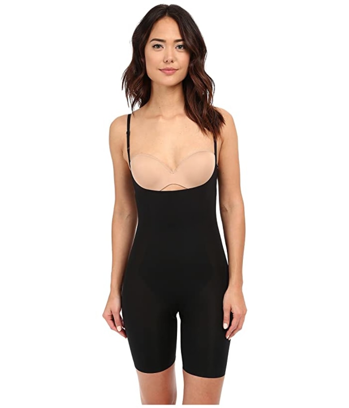 SPANX Women's Oncore Open Bust Mid Thigh Compression Bodysuit : :  Clothing, Shoes & Accessories