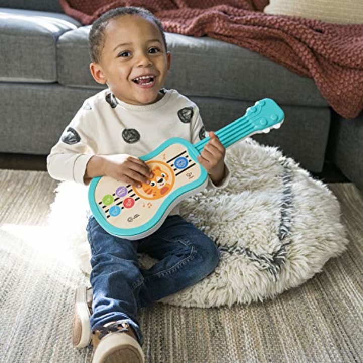 Baby Einstein Magic Touch Ukulele Wooden Musical Toy, Ages 12 months +