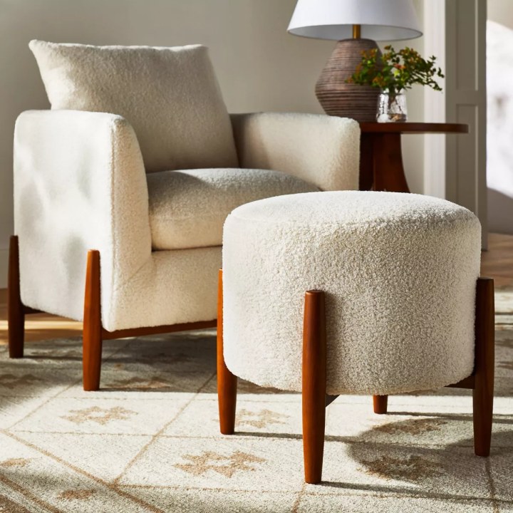 Elroy Faux Shearling Round Ottoman with Wood Legs