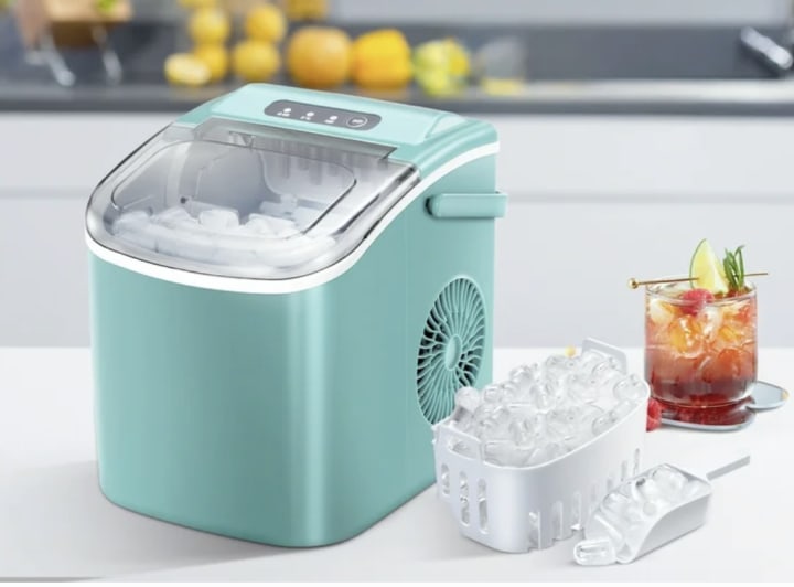 Countertop ice maker next to drink with ice