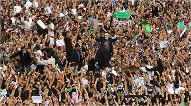 Mir Hussein Moussavi and supporters at a rally on Thursday in Tehran.