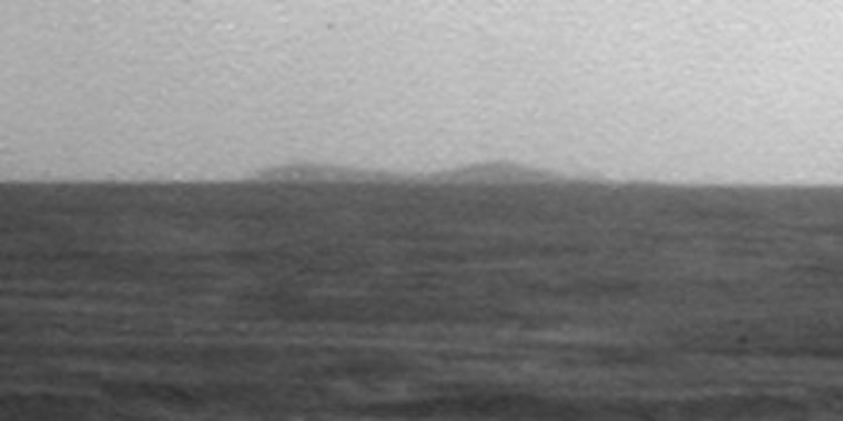 A northern portion of the rim of Endeavour Crater is visible on the horizon of this image taken by the panoramic camera on NASA's Mars Exploration Rover Opportunity on March 7, 2009.