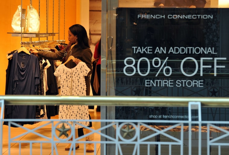 Image: A woman shops at a store in a mall in Wa