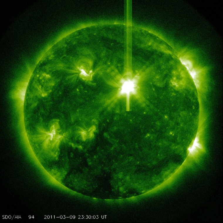 The sun unleashed a powerful Class X1.5 solar flare on Thursday, a storm that could supercharge Earth's auroras. It was recorded by NASA's Solar Dynamics Observatory and other spacecraft. Here, it appears in white at the upper right of the sun as seen by the Solar Dynamics Observatory.