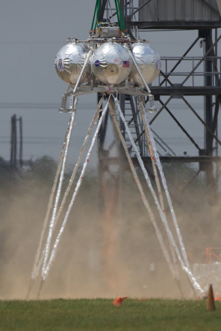 NASA's Morpheus lander, packed with innovative technologies onboard, is seen during its second tethered engine test at Johnson Space Center in Houston.