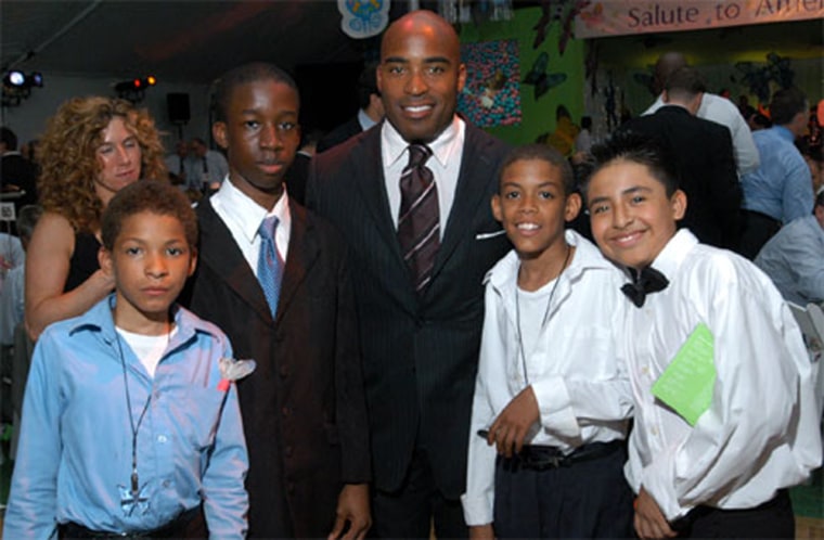 Tiki Barber and some children who participated in Fresh Air Fund camps attend the charity organization’s spring gala at Tavern on the Green in New York in June.