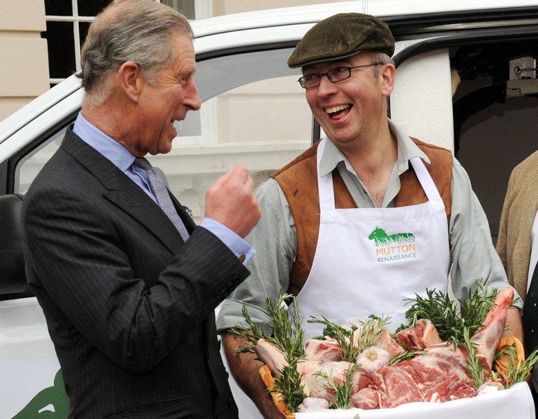 Britain's Prince Charles, founder of the Mutton Renaissance Campaign and patron of The Academy of Culinary Arts, receives the the first Renaissance mutton of the season from butcher Andrew Sharp, at his London home on Thursday. The prince celebrates his 60th birthday on Friday.
