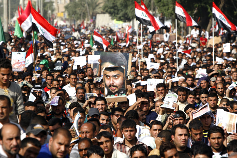 Image: Moqtada al-Sadr supporters march in Baghdad