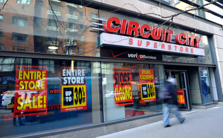 Image: People walk by Circuit City
